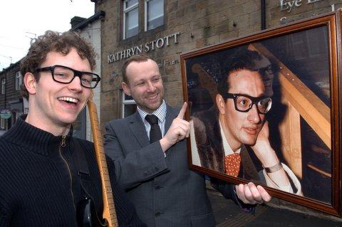 GOING WEST: Optician and musical director Royston Bayfield checks the likeness between local actor Roger Rowley and rock ’n’ roll legend Buddy Holly before Roger heads for the West End to play the pop idol.